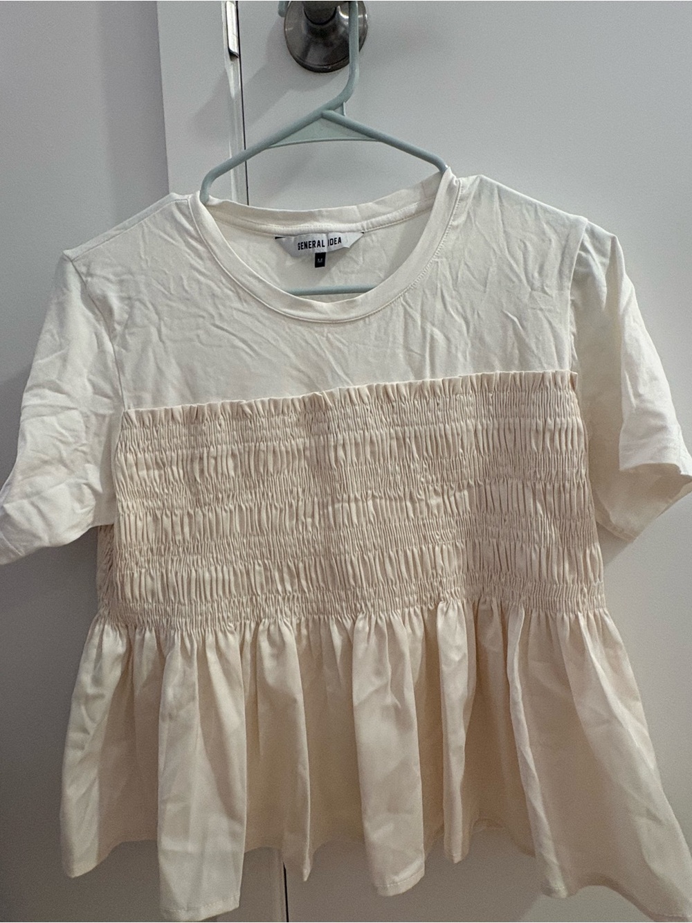 Cream Smocked Peplum Short Sleeve Top